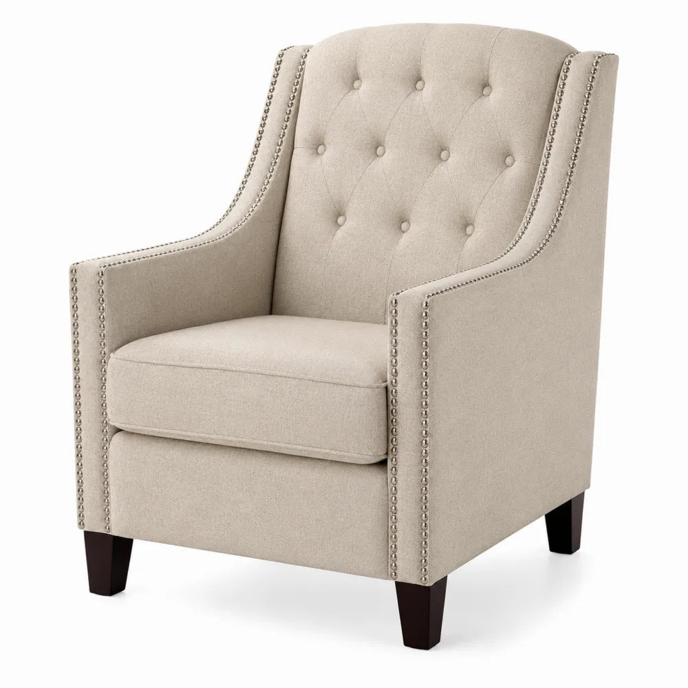 Fauteuil en lin beige avec clous décoratifs et pieds en bois